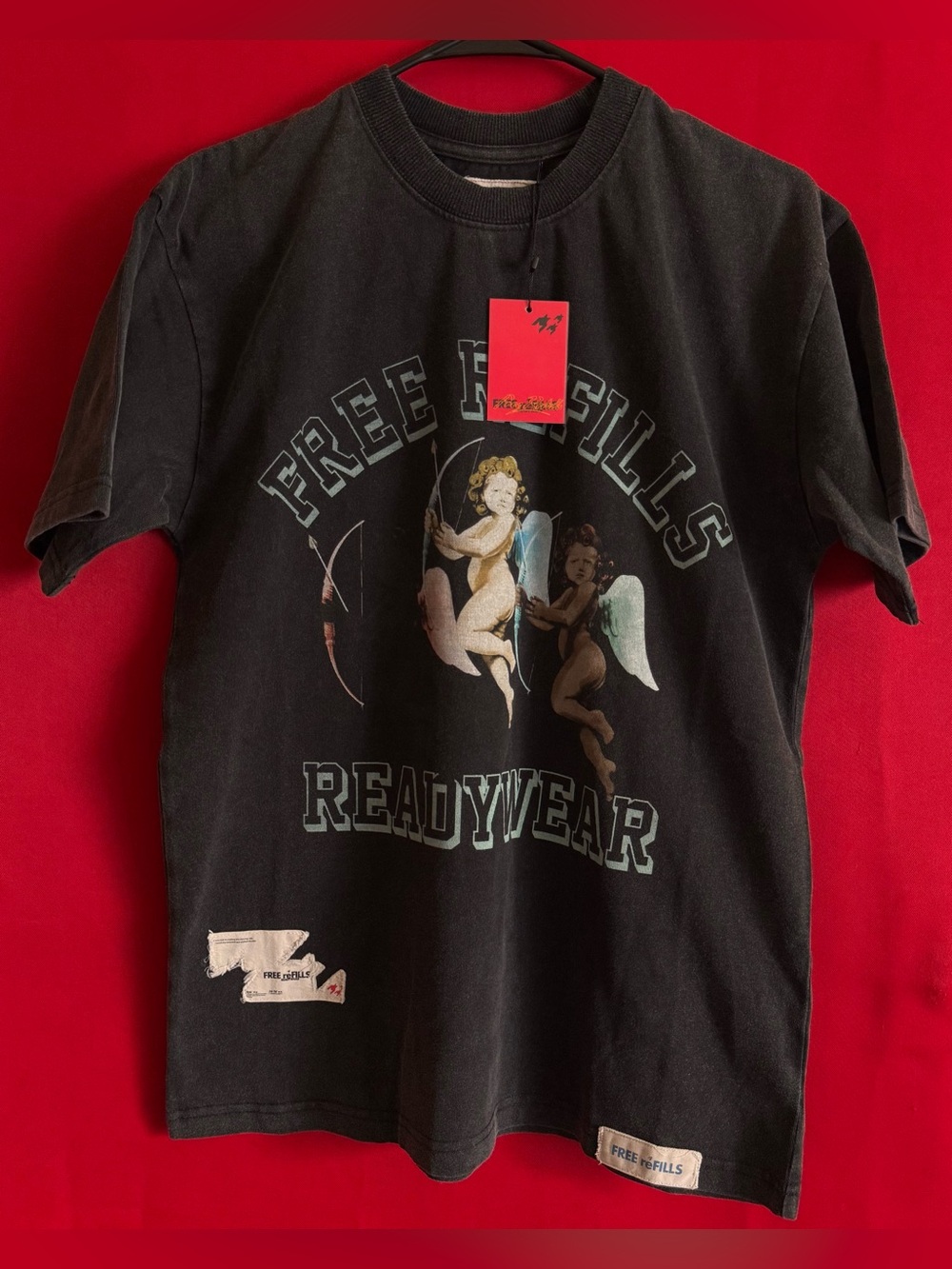 #513-FREE REFILLS “Unisex” Black Graphic Tee -Angel Design Size Small